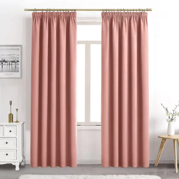 pink pleated curtains hanging on door